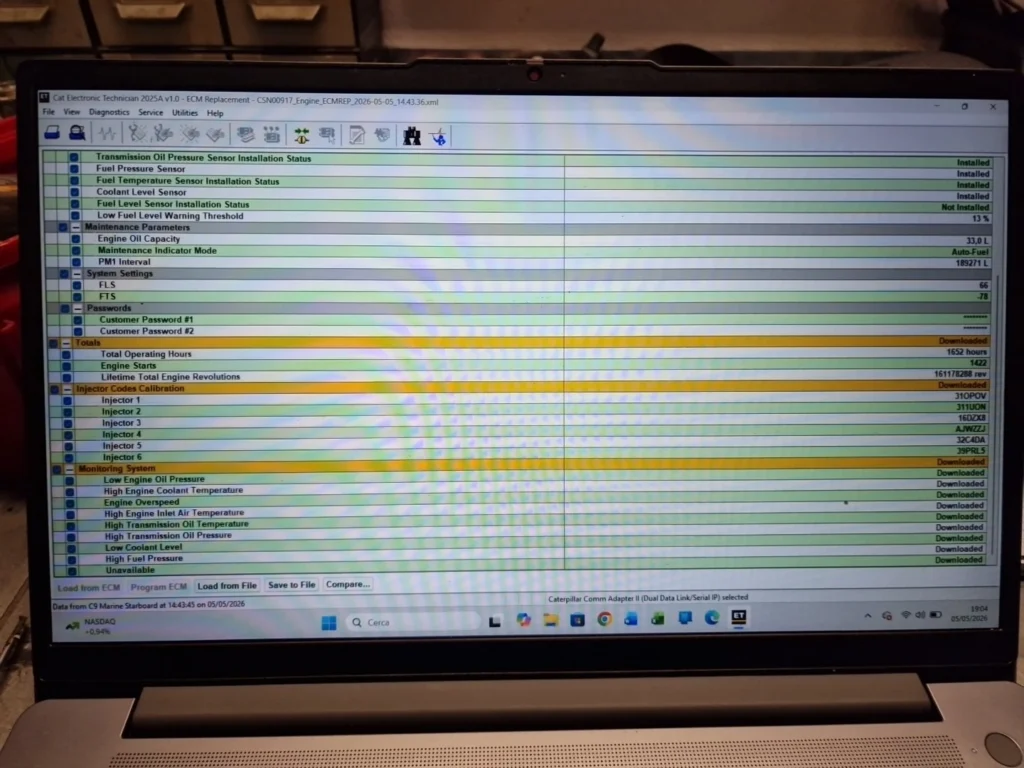 Cat Electronic Technician 2025A ECM Replacement screen showing downloaded configuration for C9 marine engine CSN00917, including injector codes, operating hours 1652, and sensor parameters