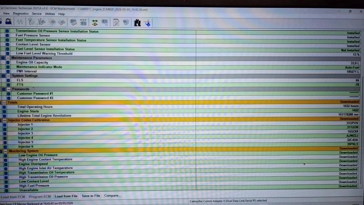 Cat Electronic Technician 2025A ECM Replacement screen showing downloaded configuration for C9 marine engine CSN00917, including injector codes, operating hours 1652, and sensor parameters