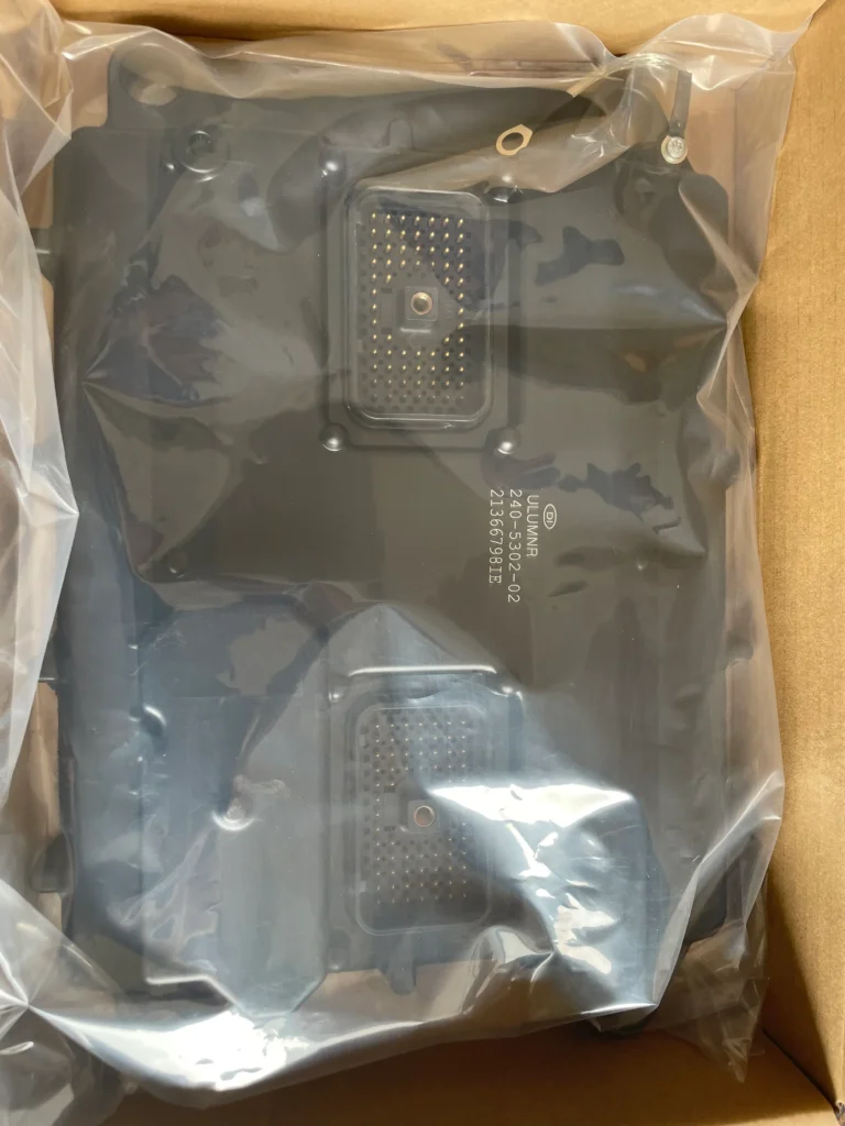 New Caterpillar 240-5302-02 engine control module in ESD anti-static bag, part number visible on label, ready for Cat ET programming