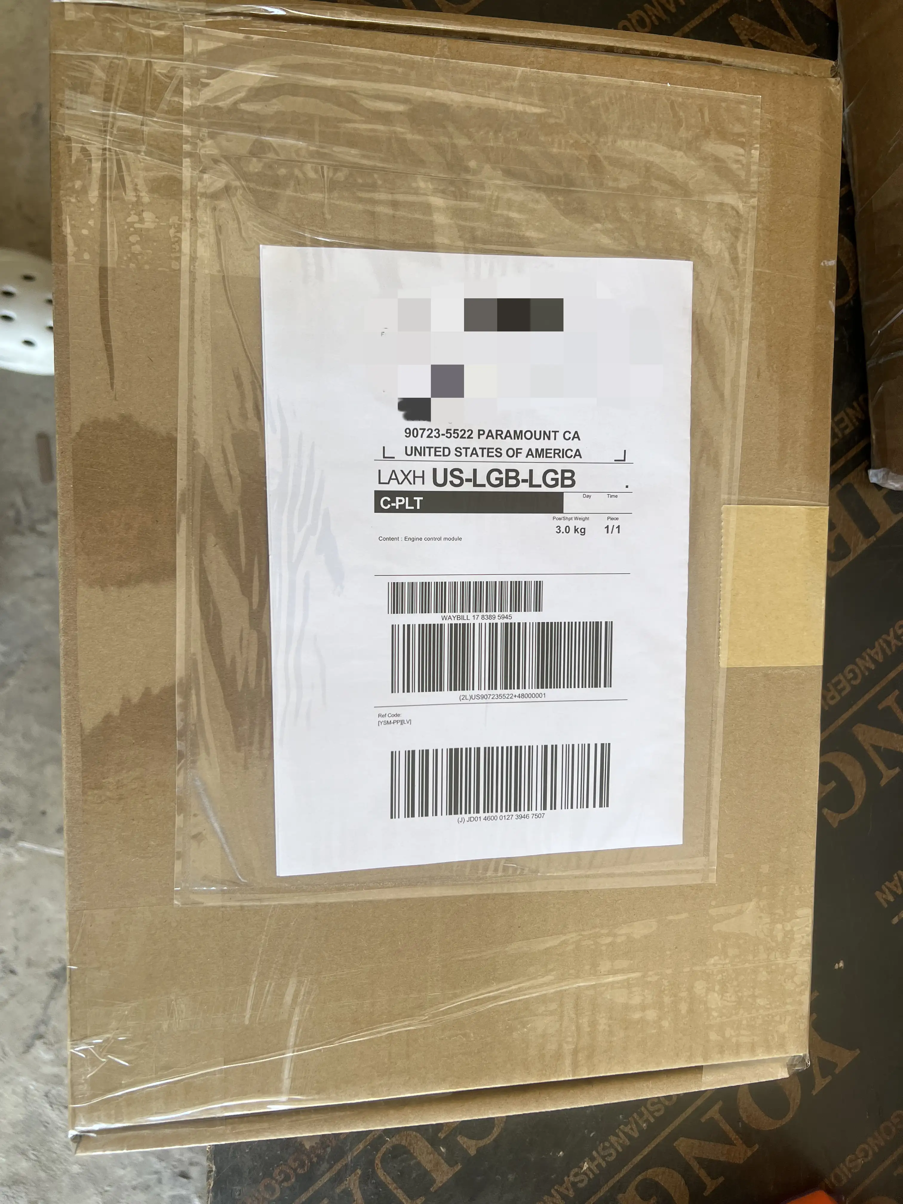 DHL shipping label applied to 10R-4092 ECM parcel bound for the United States