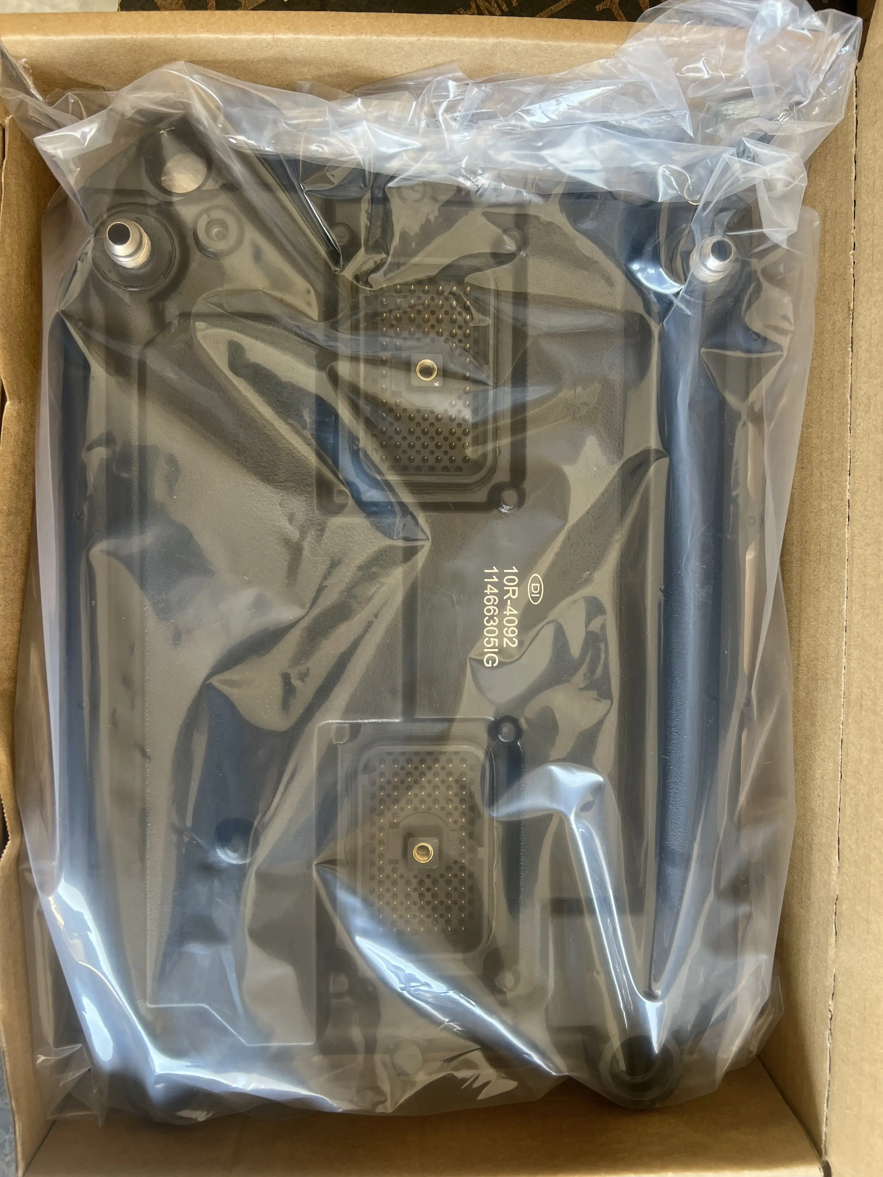 Remanufactured 10R-4092 ECM packed with protective material before international shipment